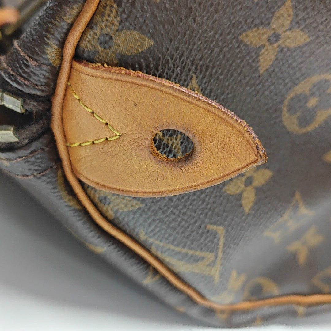 SPEEDY 30 Monogram Coated Canvas Brown