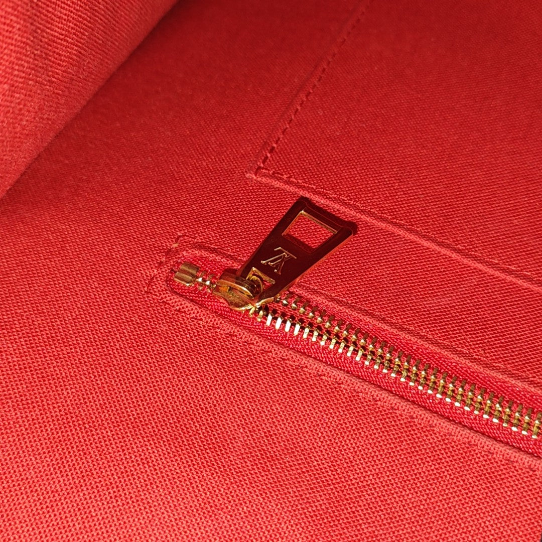 ONTHEGO MM Monogram Coated Canvas Brown