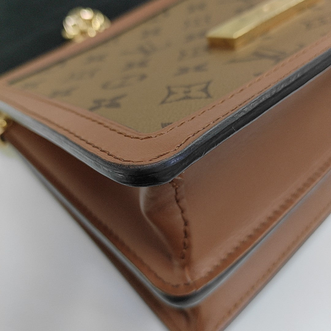 DAUPHINE MM Monogram Coated Canvas Brown