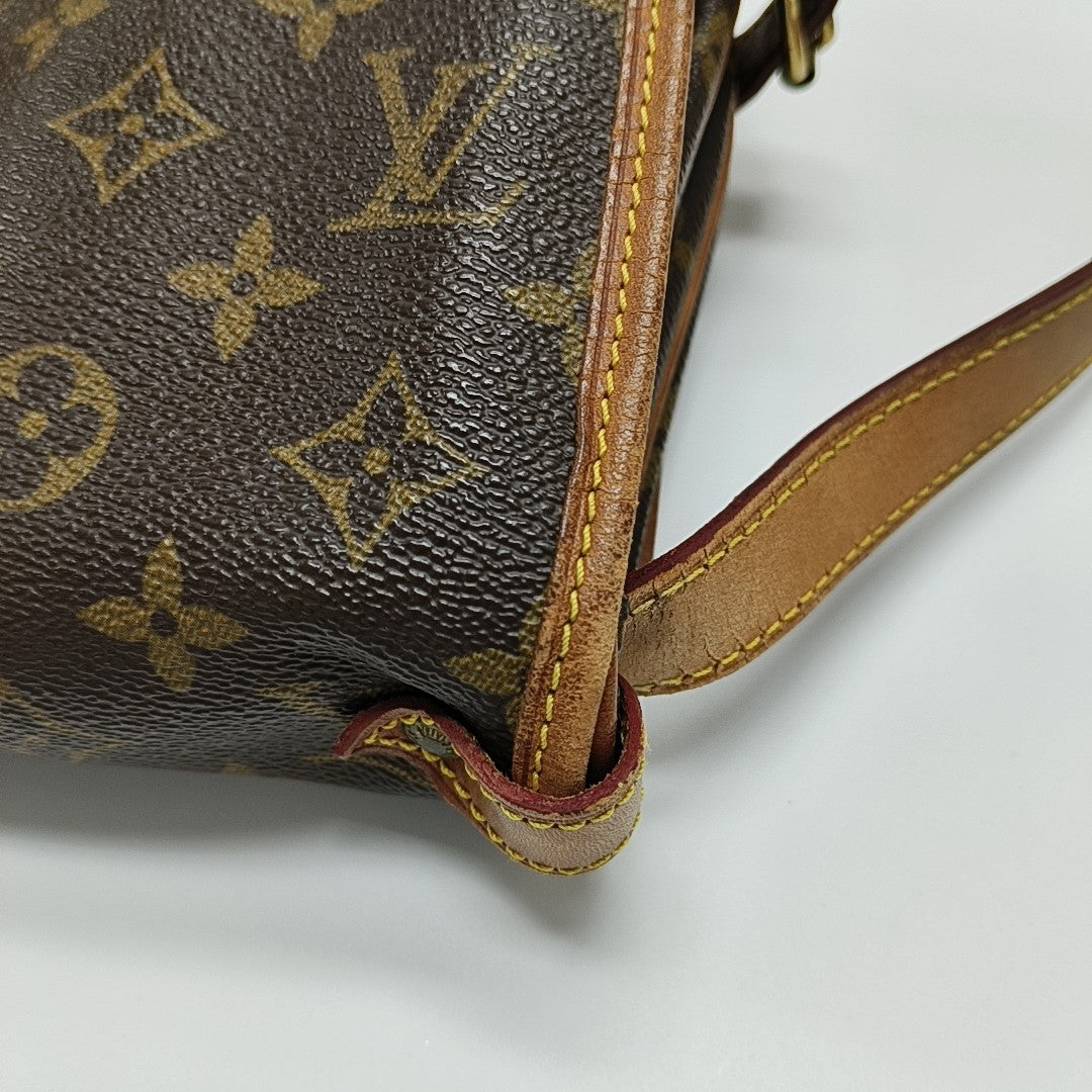 SAUMUR Monogram Coated Canvas Brown