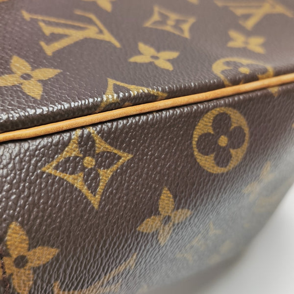 EXCENTRI-CITE Monogram Coated Canvas Brown
