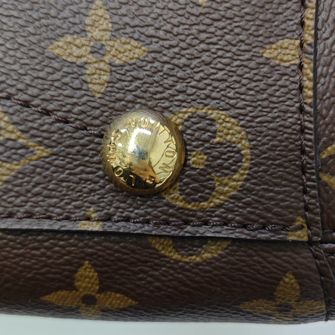 MONTAIGNE Monogram Coated Canvas Brown