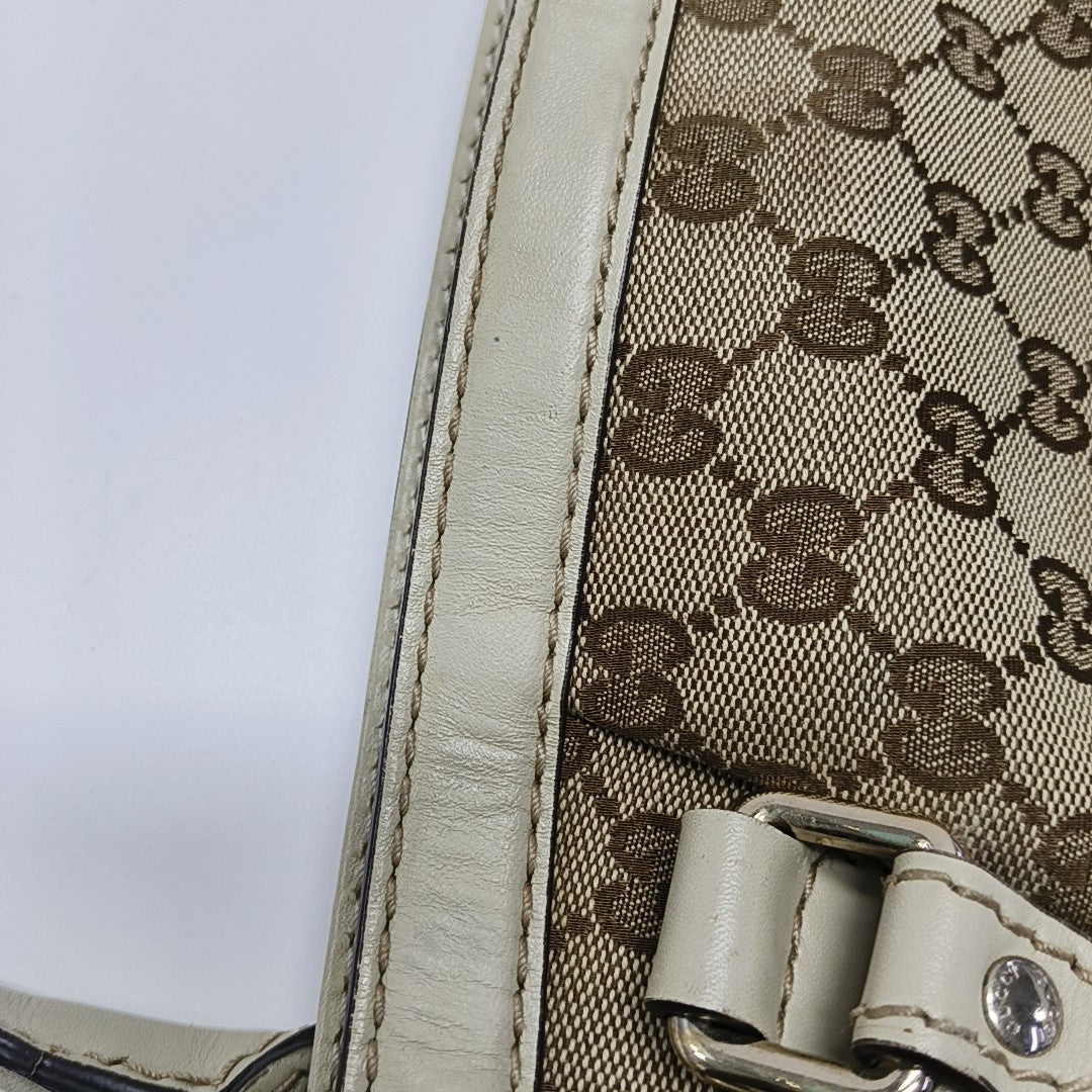 Sukey Monogram Canvas Brown