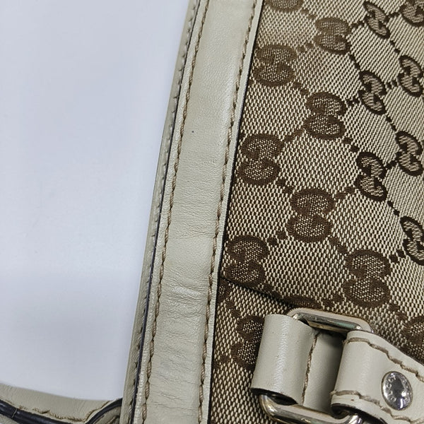 Sukey Monogram Canvas Brown