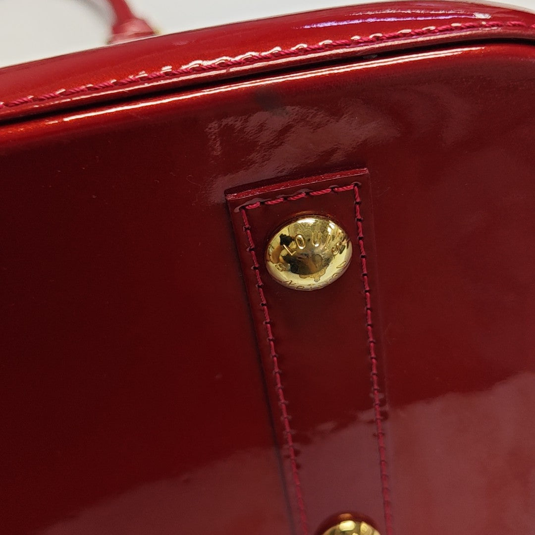 ALMA PM Monogram Patent Leather Red