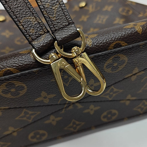 MONTAIGNE GM Monogram Coated Canvas Brown