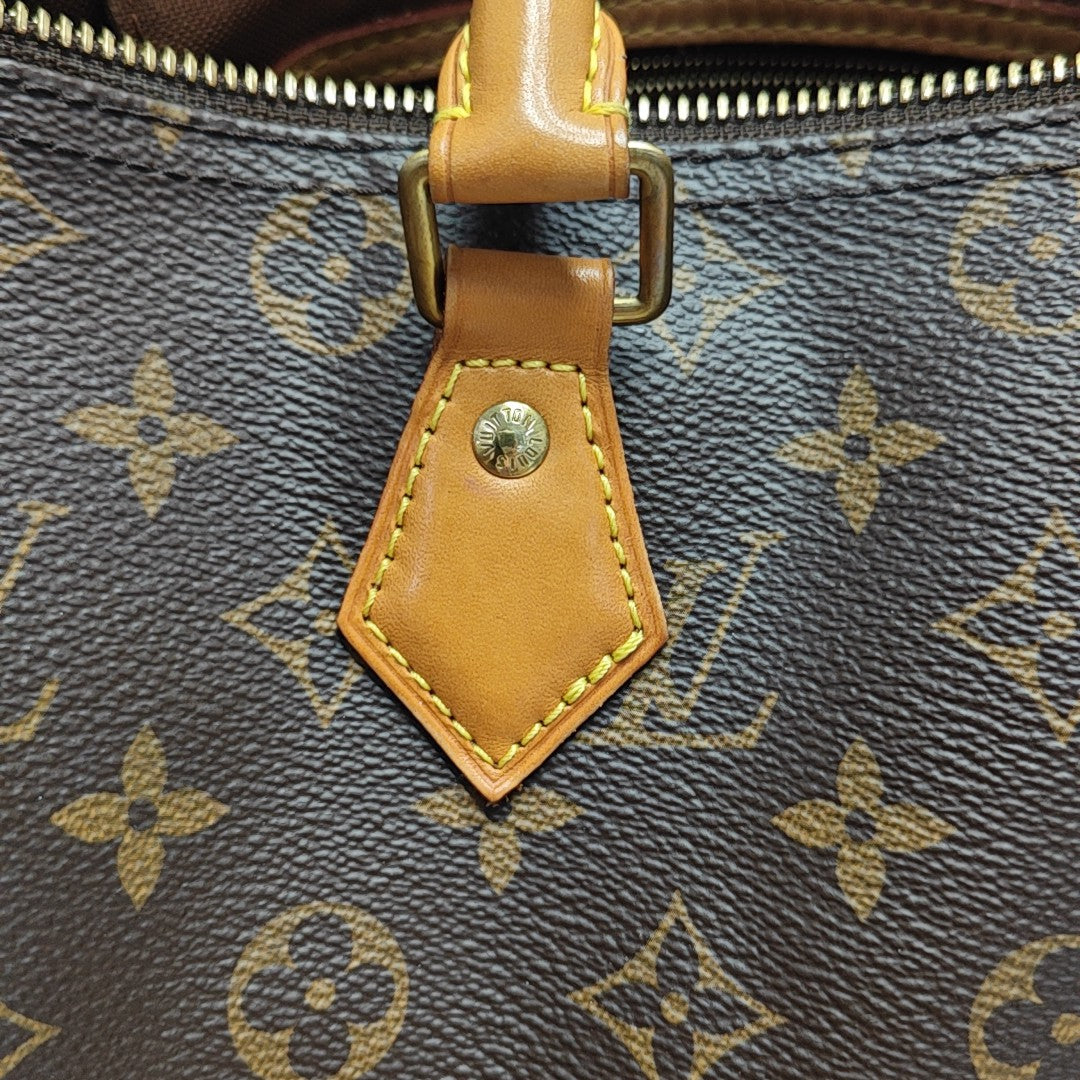 SPEEDY 30 Monogram Coated Canvas Brown