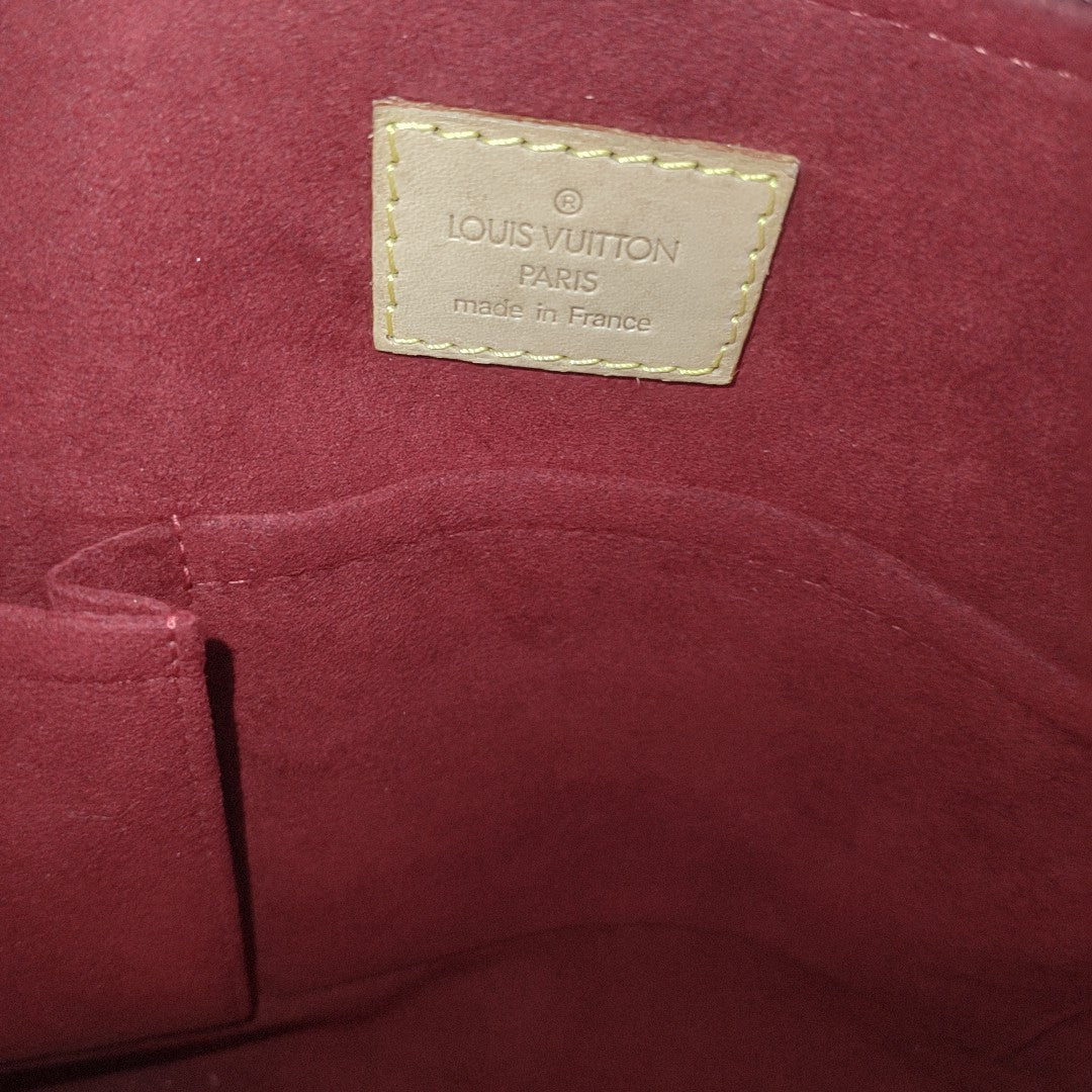 COUSSIN GM Monogram Coated Canvas Brown