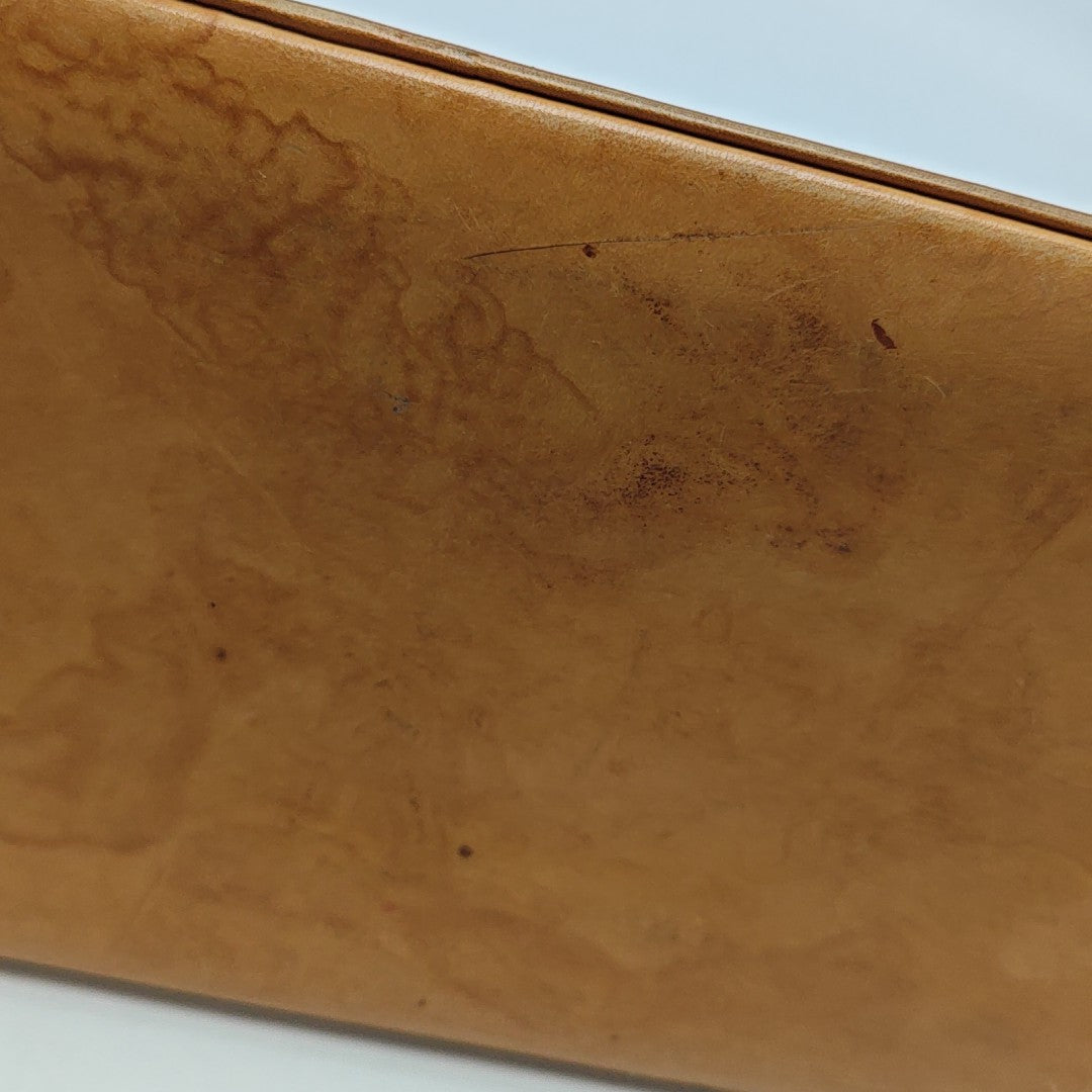 ALMA PM Monogram Coated Canvas Brown