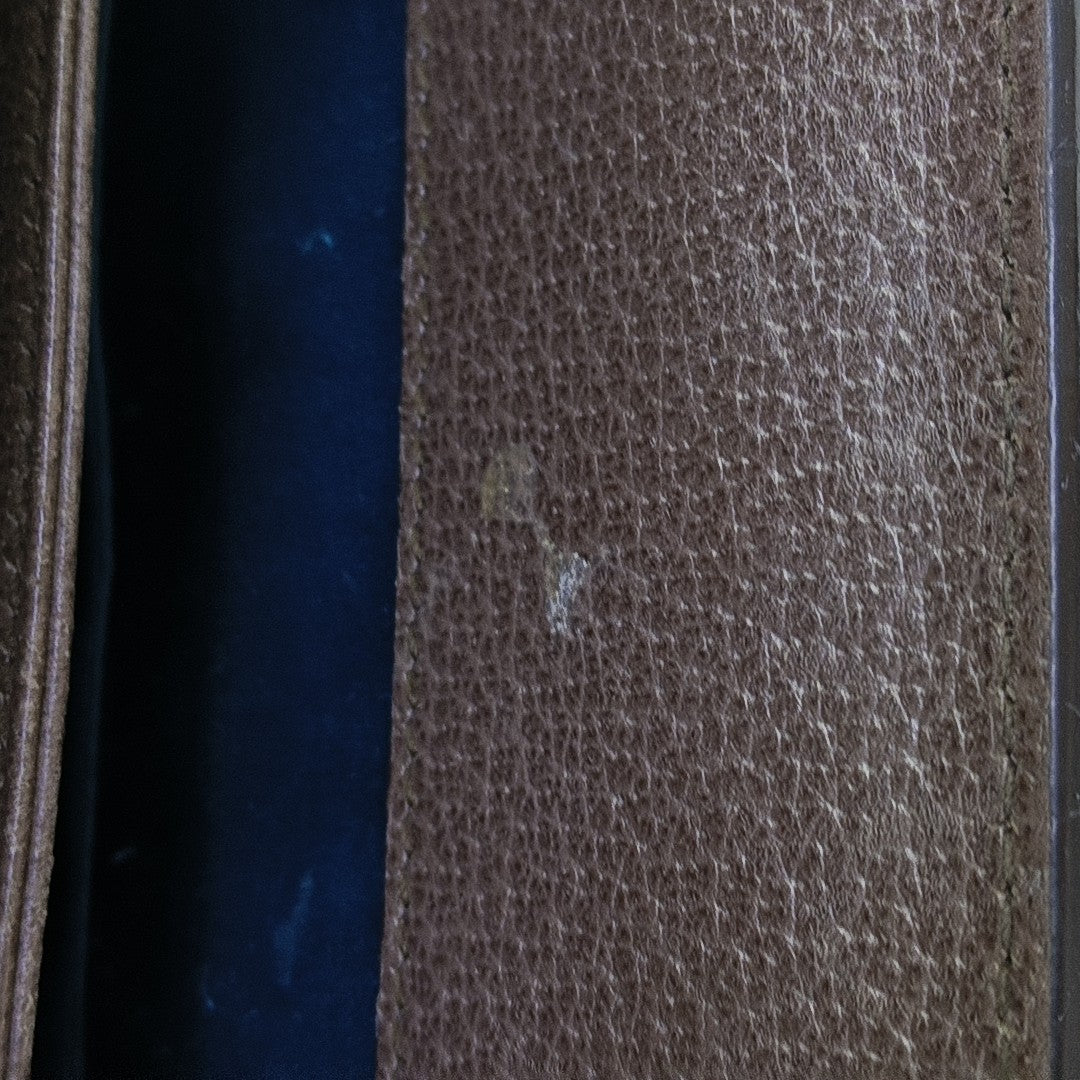 Ophidia mediana lona revestida con monograma beige