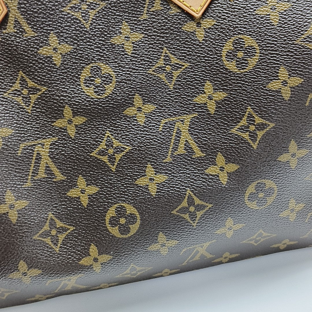 SPEEDY 30 Monogram Coated Canvas Brown