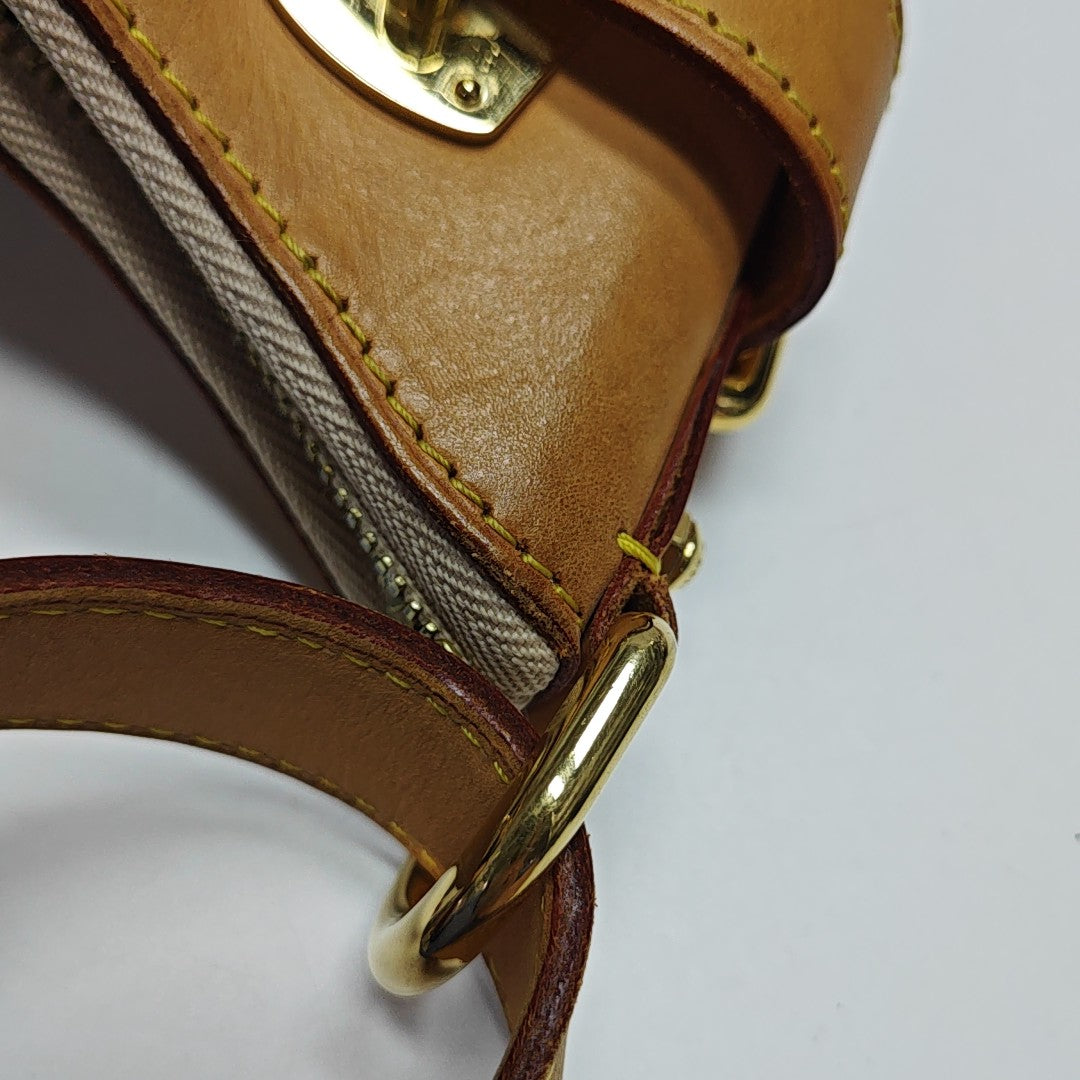 LV × TM GRETA Monogram Coated Canvas Black