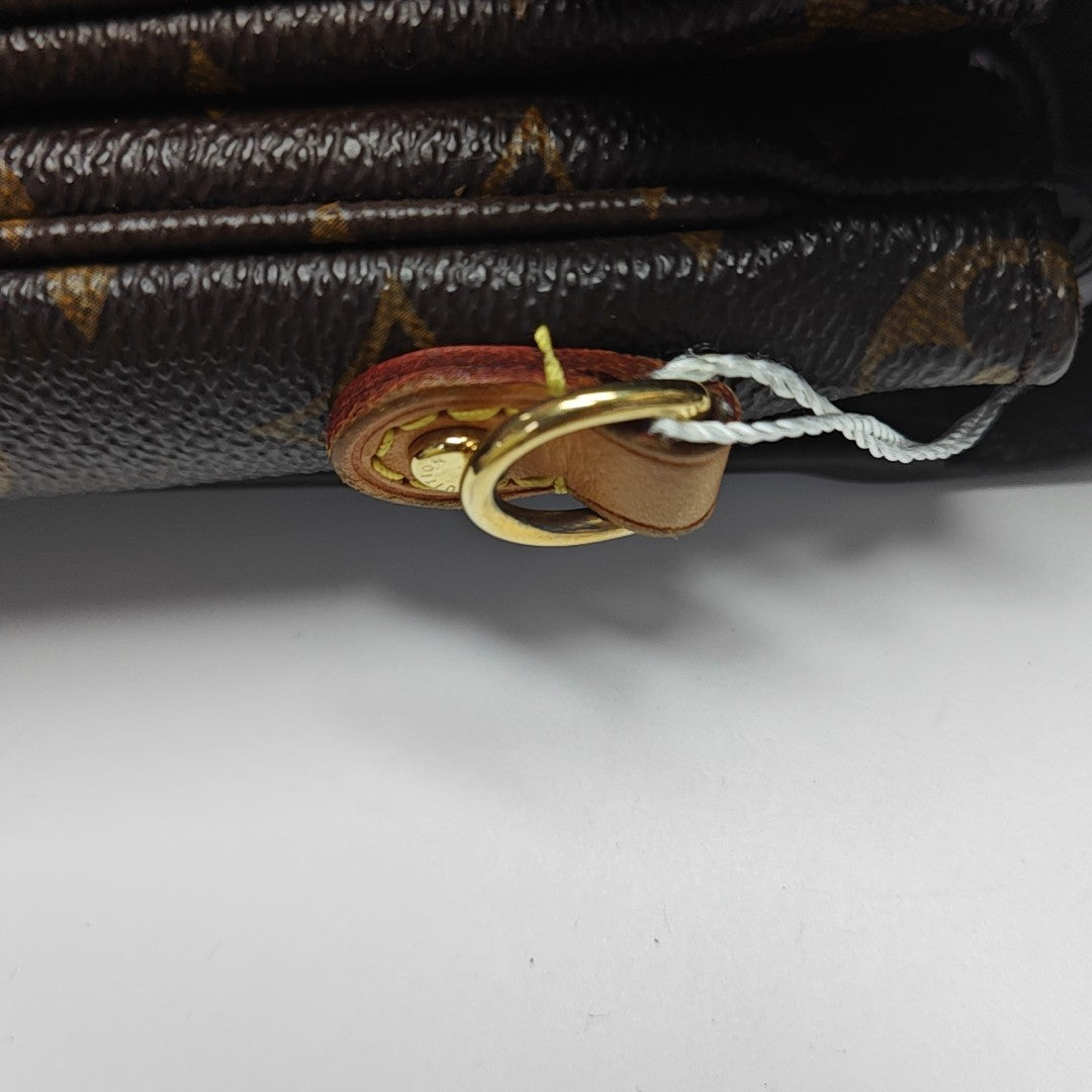 MÉTIS MM Monogram Coated Canvas Brown
