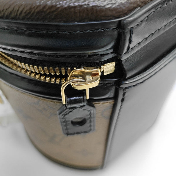 CANNES PM Monogram Coated Canvas Brown