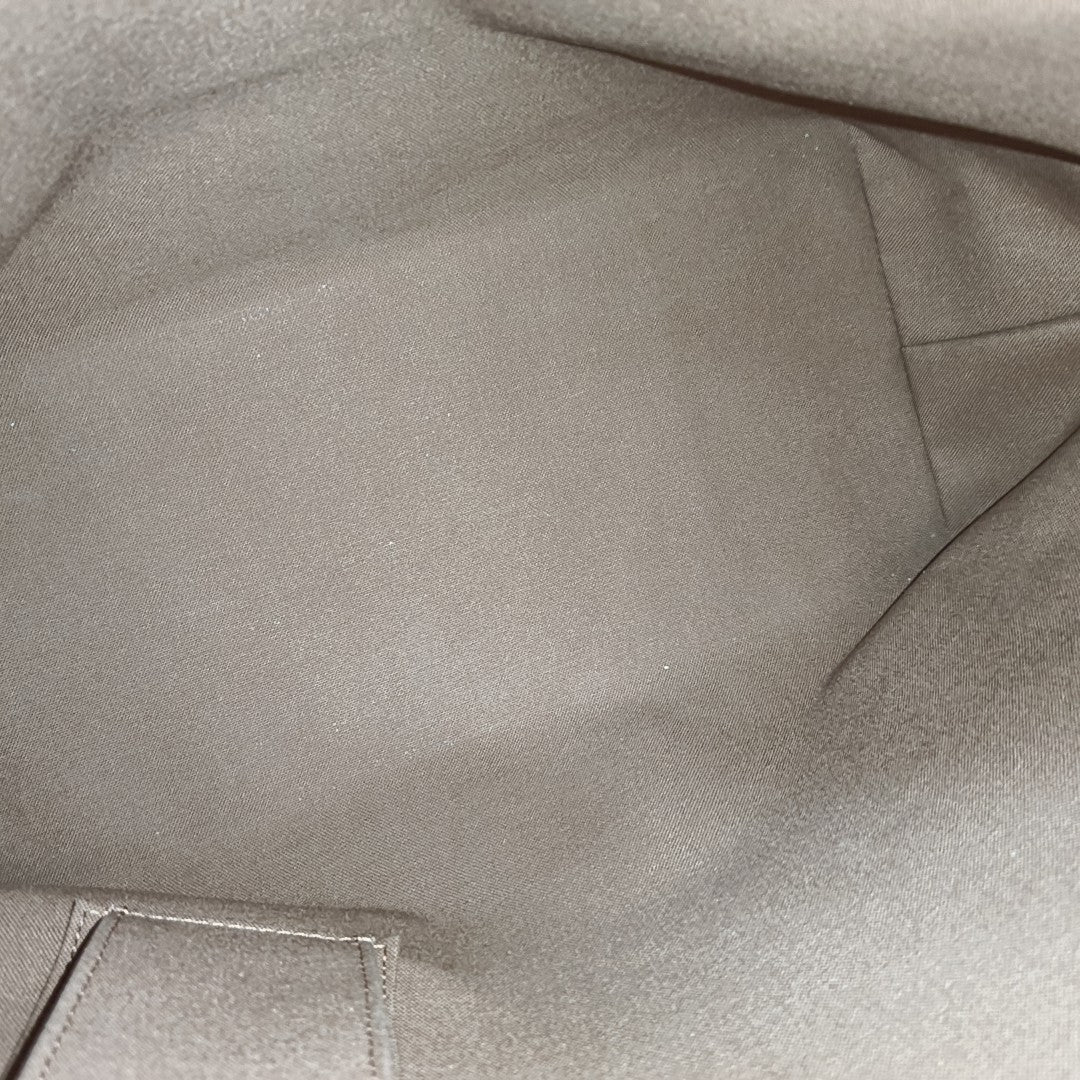PIANO Monogram Coated Canvas Brown