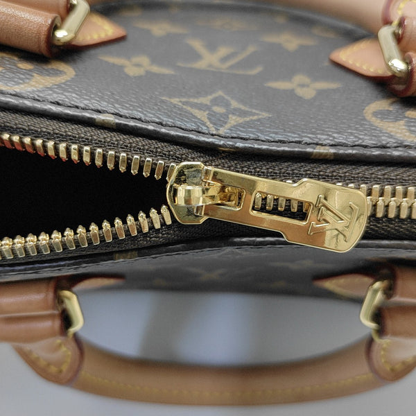 SPEEDY 20 Monogram Coated Canvas Brown