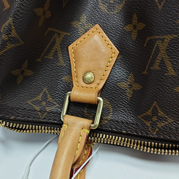SPEEDY 25 Monogram Coated Canvas Brown