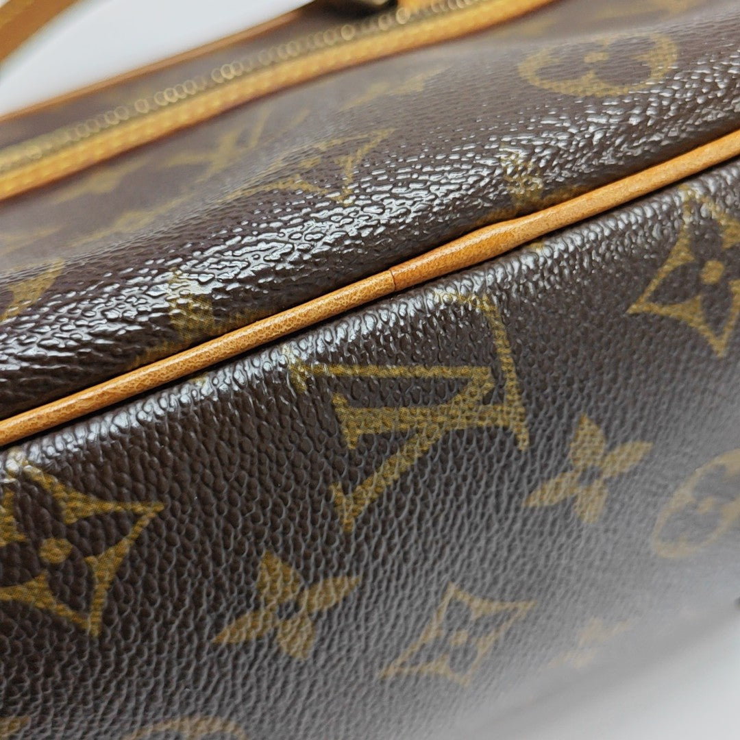 CITE Monogram Coated Canvas Brown