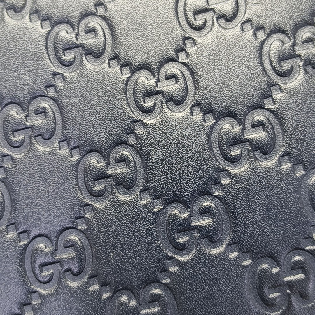 Monogram Calfskin Clutch Blue