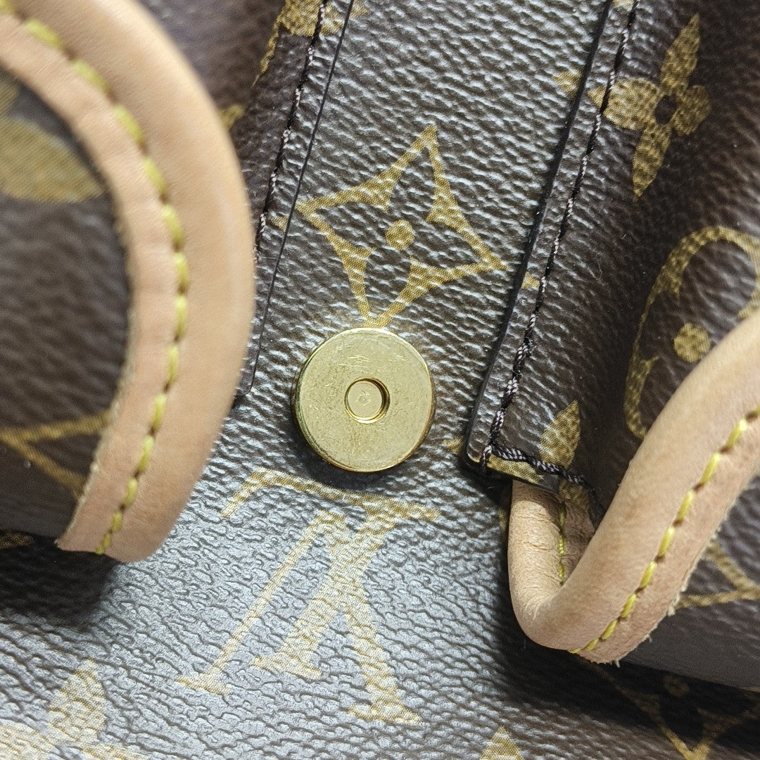 EXCURSION PM Monogram Coated Canvas Brown