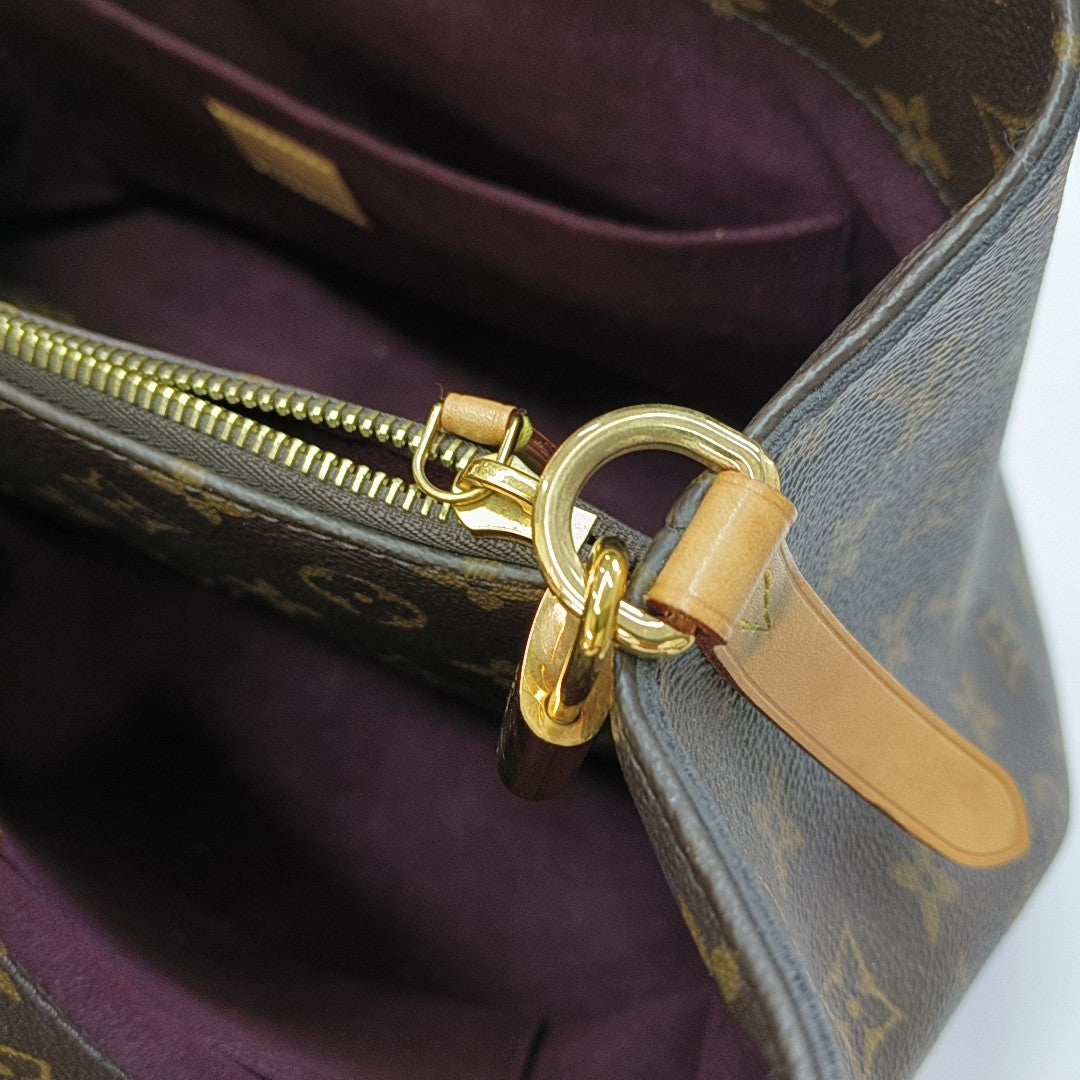 MONTAIGNE GM Monogram Coated Canvas Brown