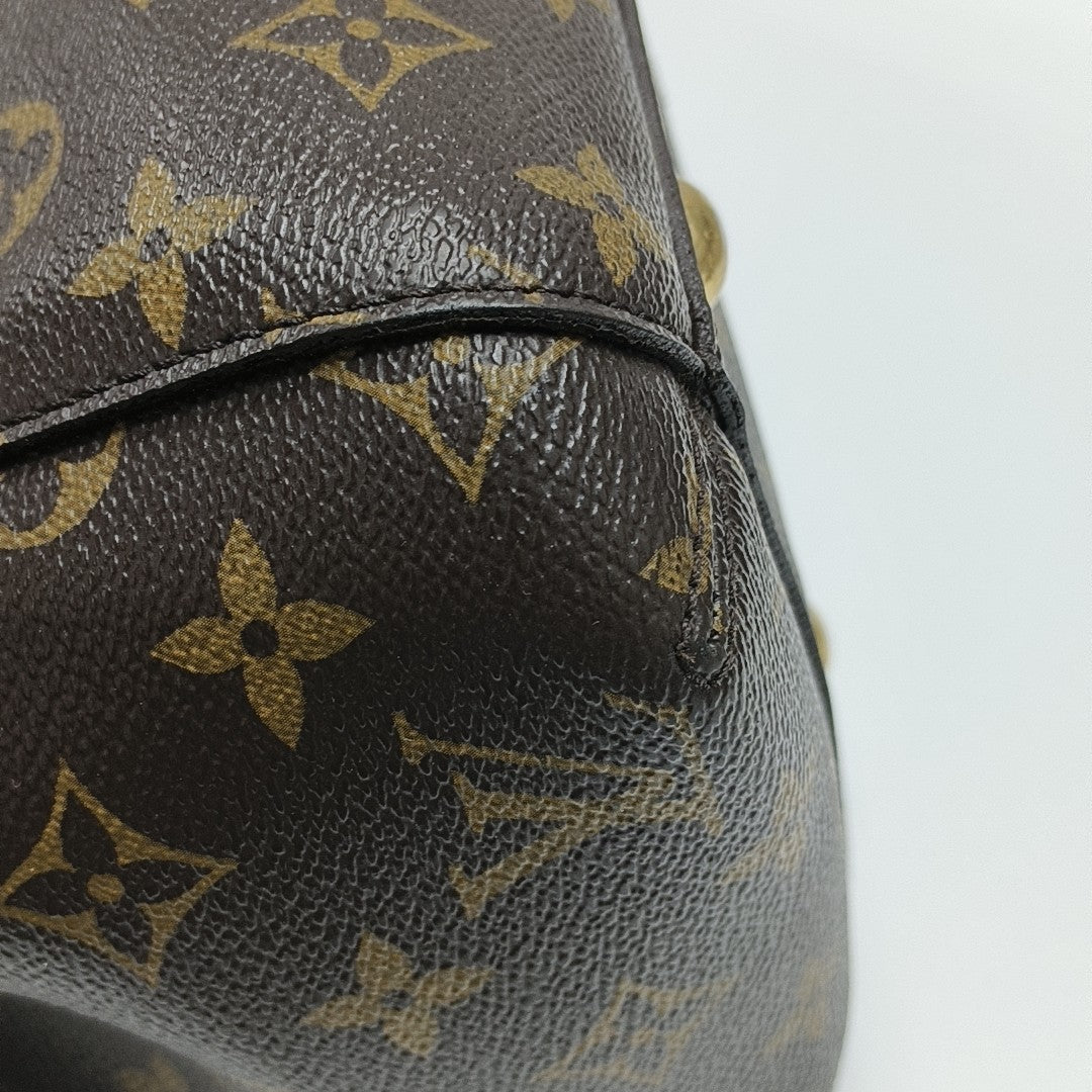 MONTAIGNE GM Monogram Coated Canvas Brown