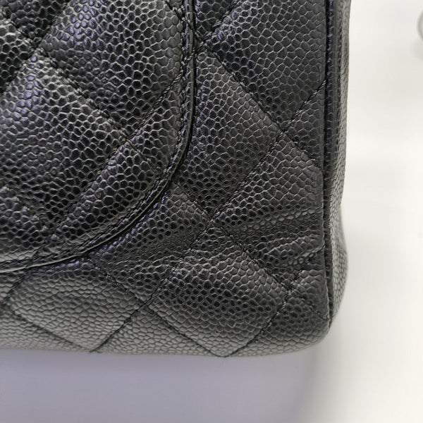 Chanel GST Large en Piel de Becerro Granulada Acolchada Negra