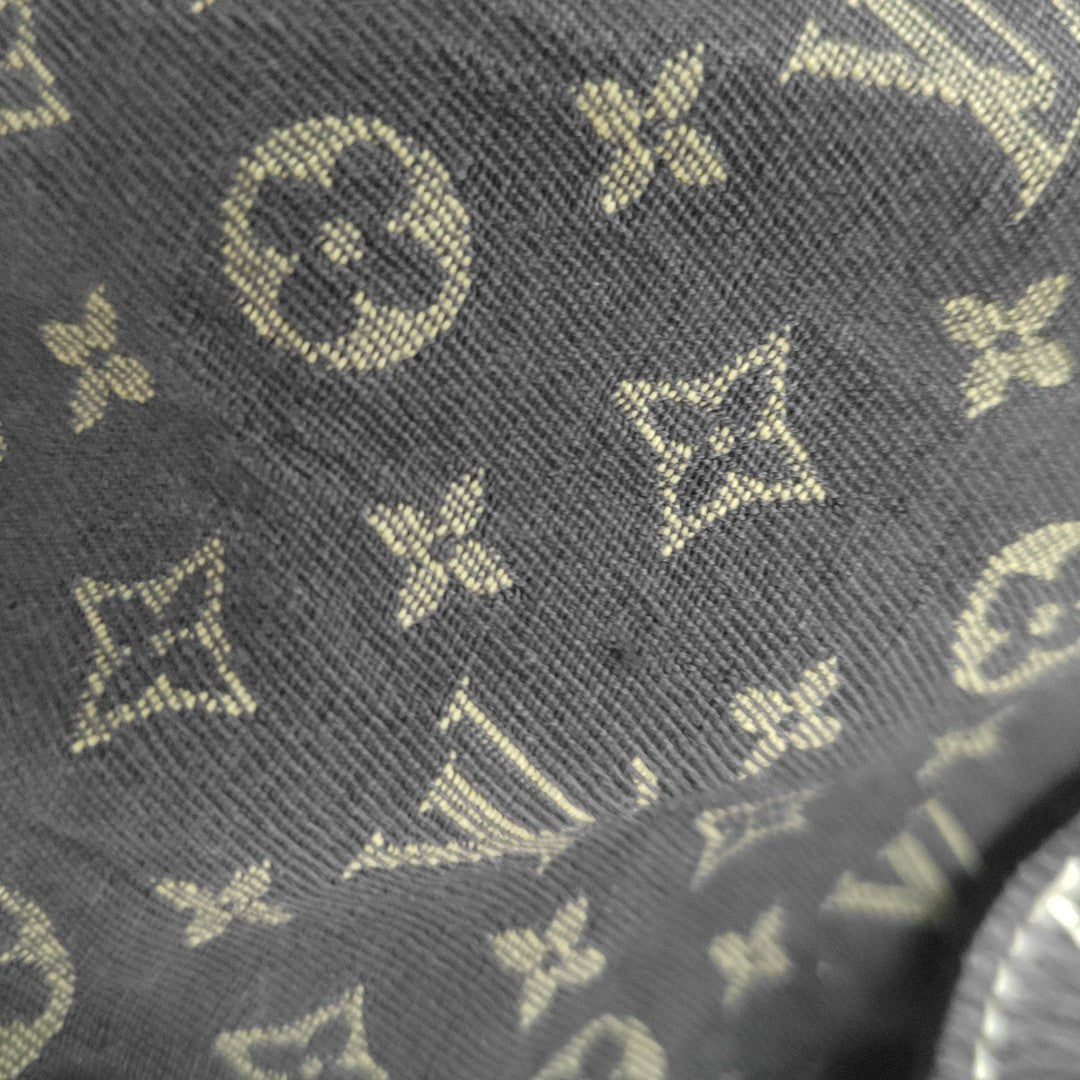 SAUMUR Monogram Canvas Brown