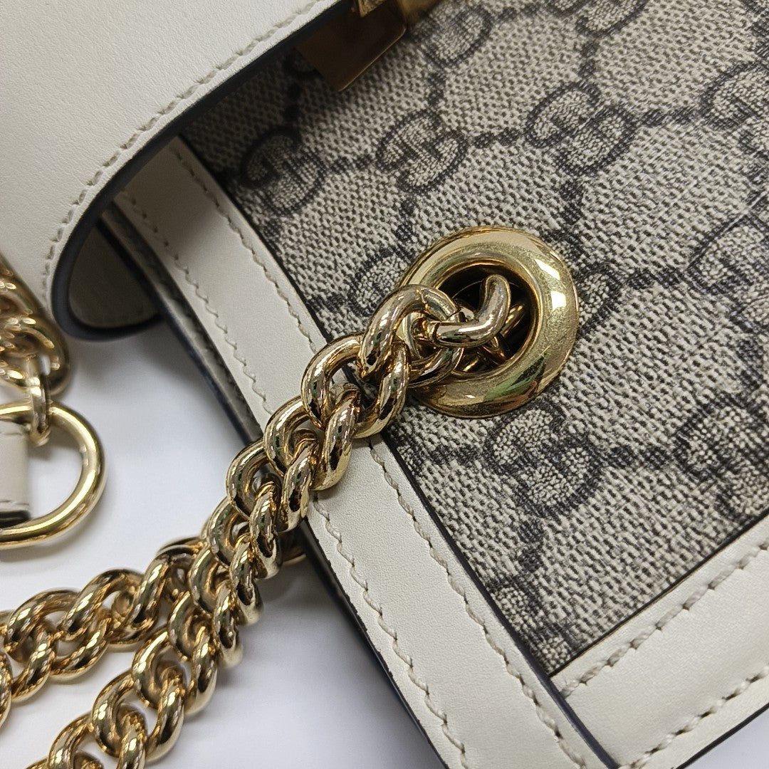 Padlock Small Monogram Coated Canvas Beige