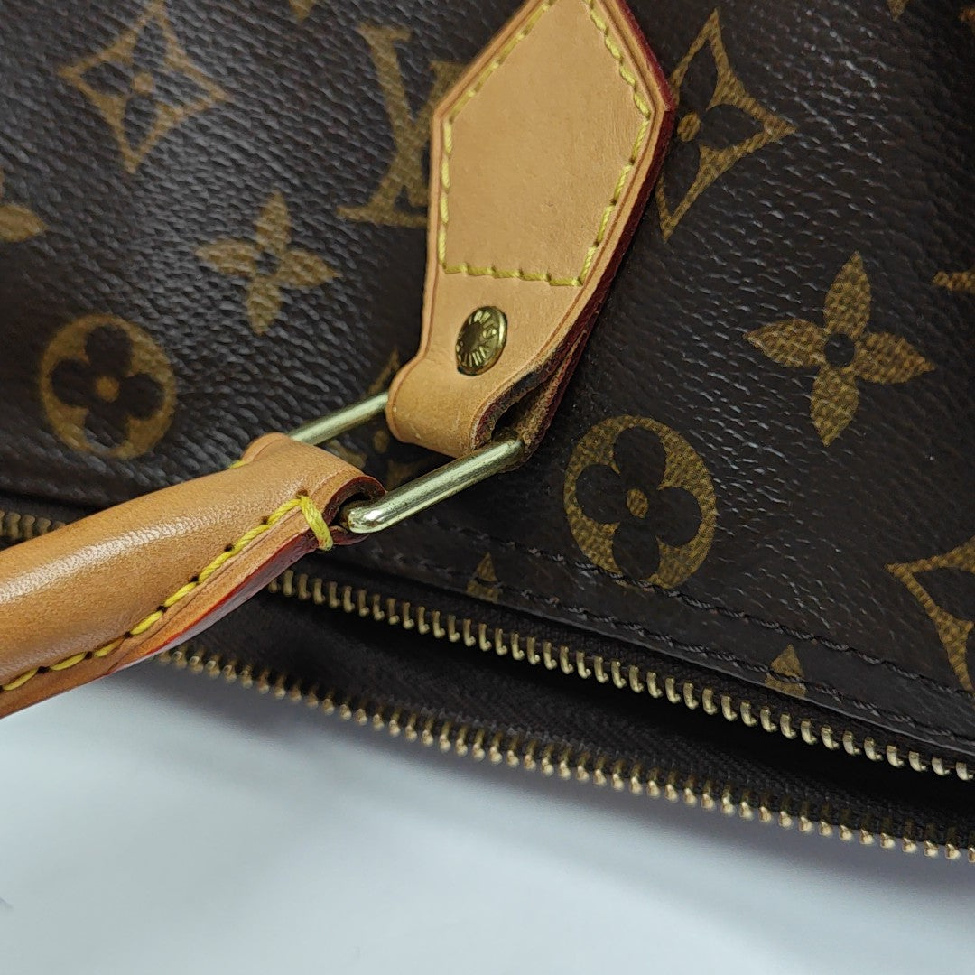 SPEEDY 30 Monogram Coated Canvas Brown