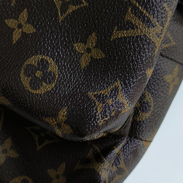 Monogram Coated Canvas Backpack Brown