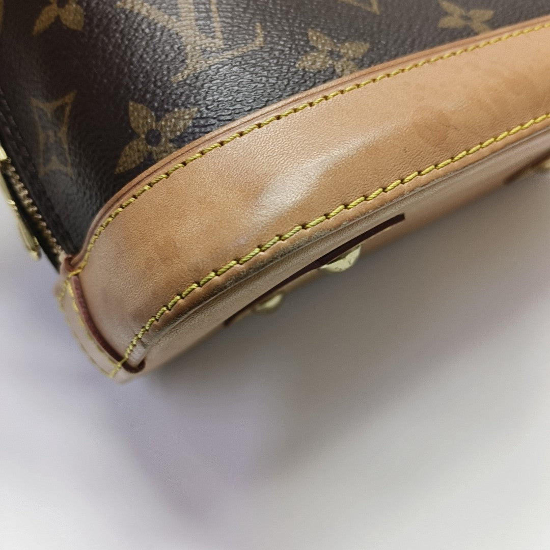 ALMA BB Monogram Coated Canvas Brown