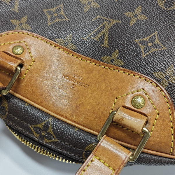 EXCURSION Monogram Coated Canvas Brown