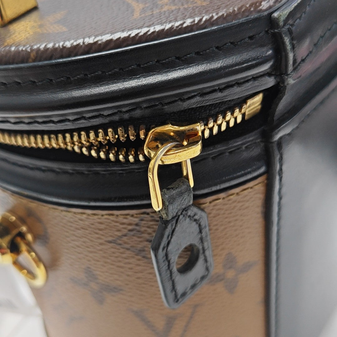 CANNES PM Monogram Coated Canvas Brown