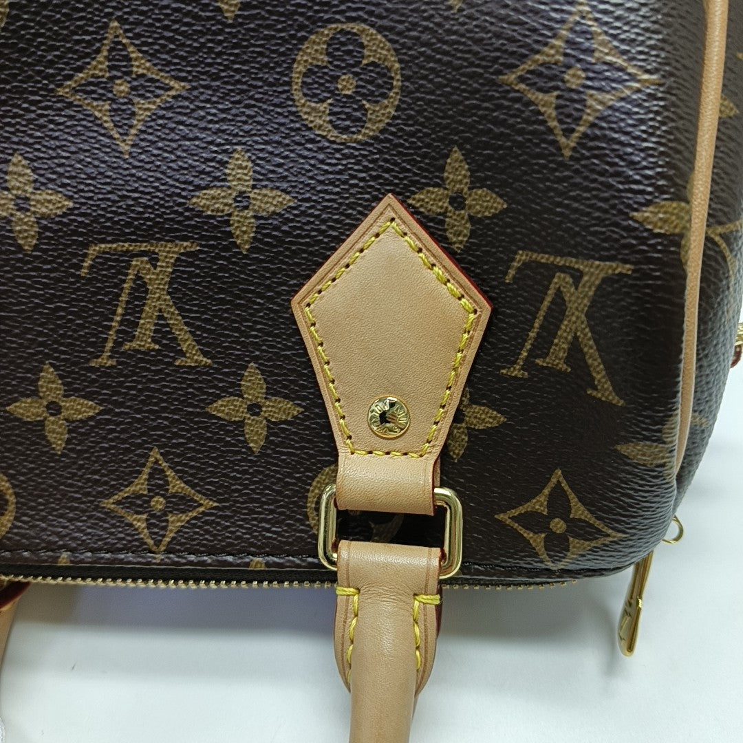 SPEEDY 20 Monogram Coated Canvas Brown