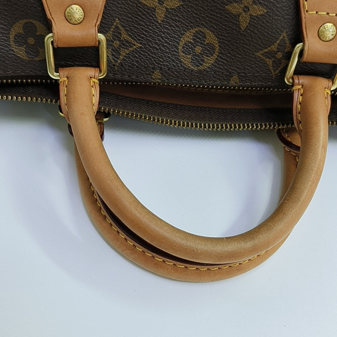 SPEEDY 30 Monogram Coated Canvas Brown