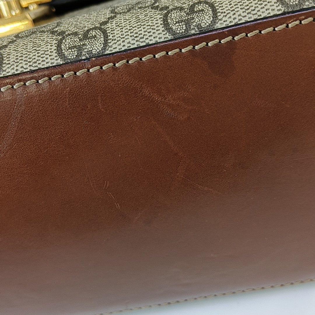 Padlock Small Monogram Coated Canvas Beige