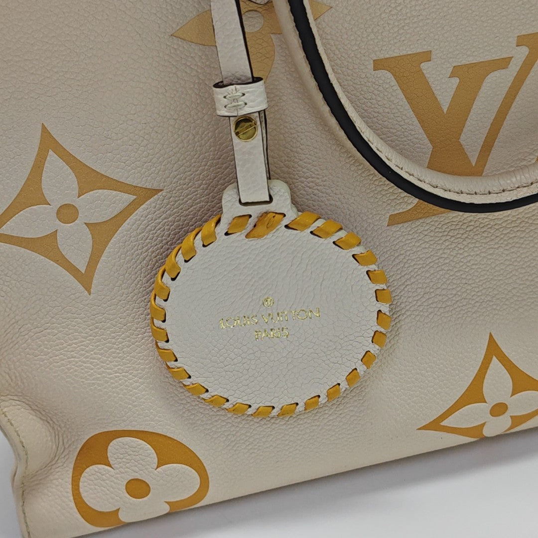 ONTHEGO MM Monogram Calfskin Beige