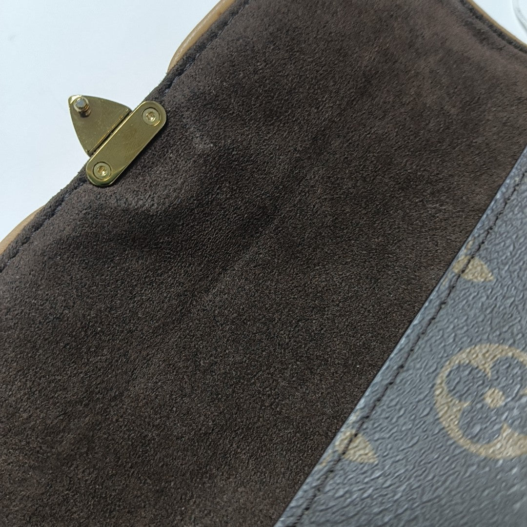 Pochette Camille Monogram Coated Canvas Brown