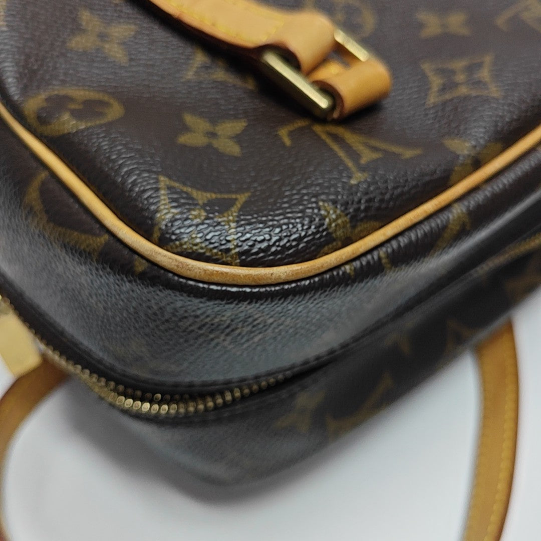 CITE MM Monogram Coated Canvas Brown