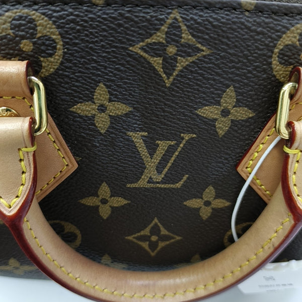 SPEEDY 20 Monogram Coated Canvas Brown