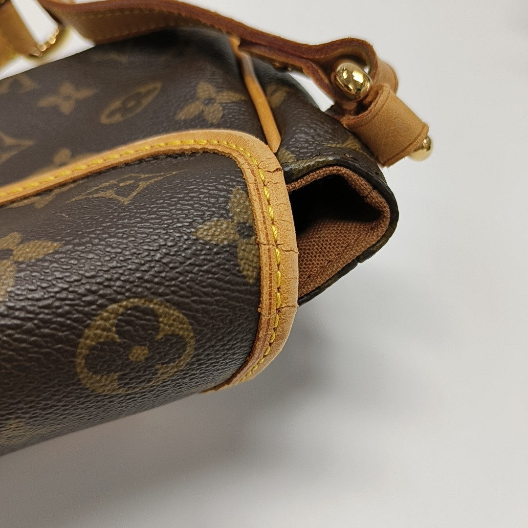 TIKAL Monogram Coated Canvas Brown