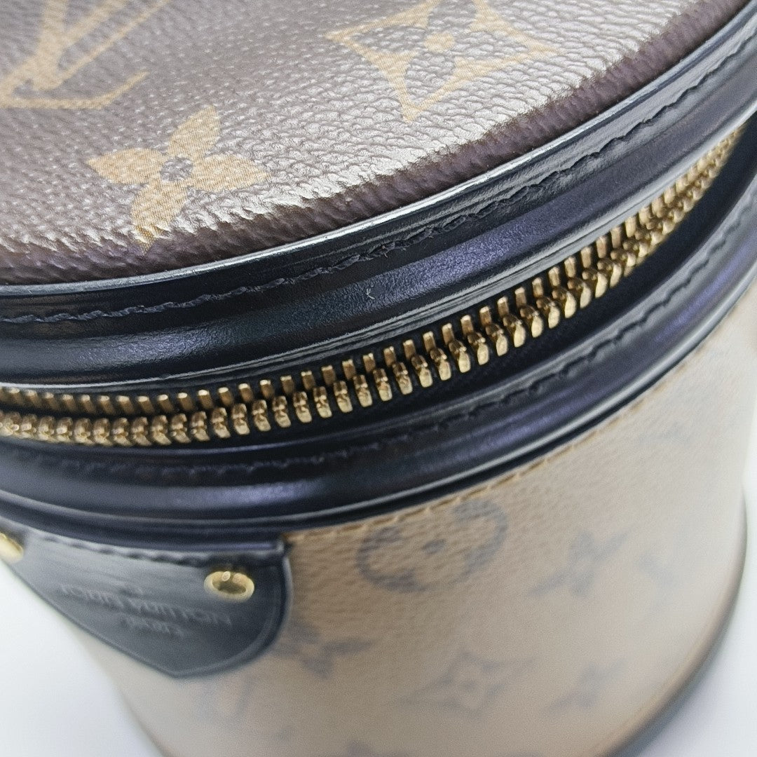 CANNES PM Monogram Coated Canvas Brown