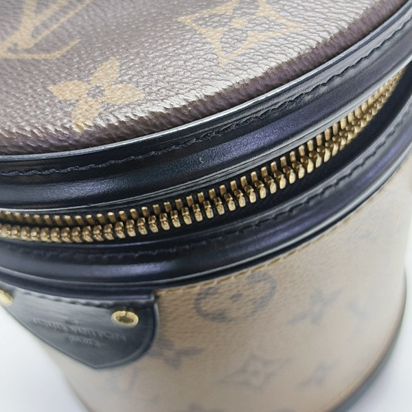 CANNES PM Monogram Coated Canvas Brown