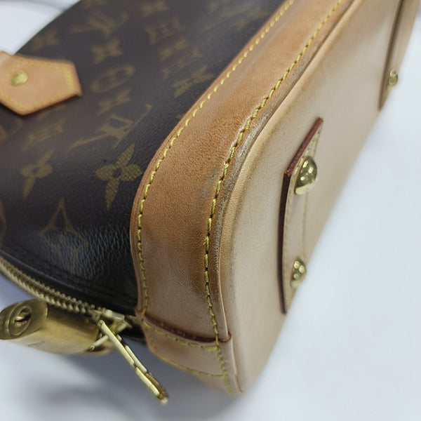 ALMA BB Monogram Coated Canvas Brown