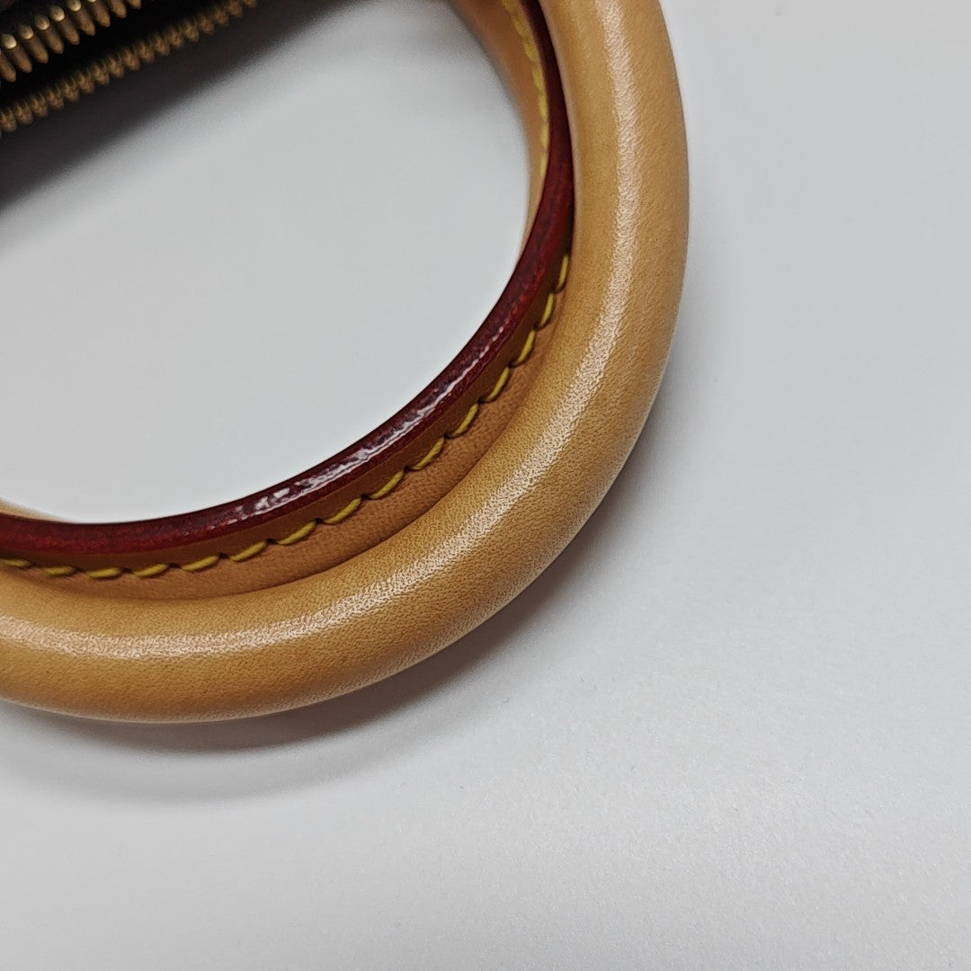 SPEEDY 25 Monogram Coated Canvas Brown