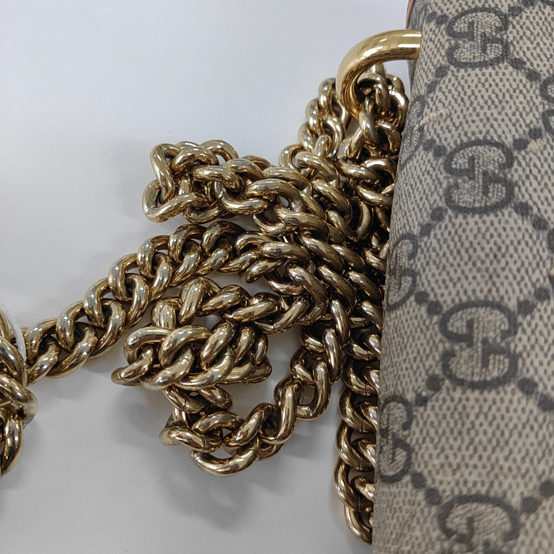 Candado pequeño Monogram lona revestida beige