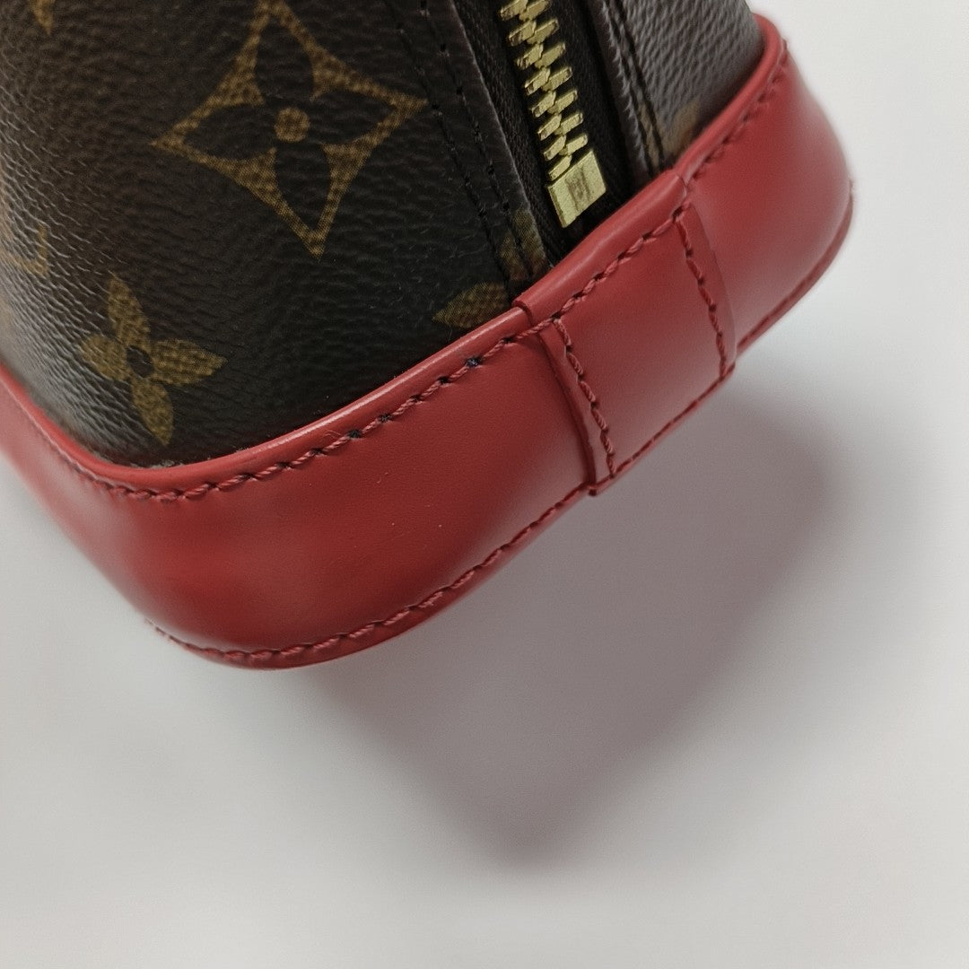 ALMA BB Monogram Coated Canvas Brown