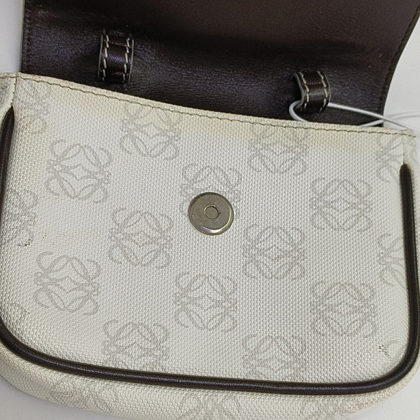 Monogram Coated Canvas Clutch White