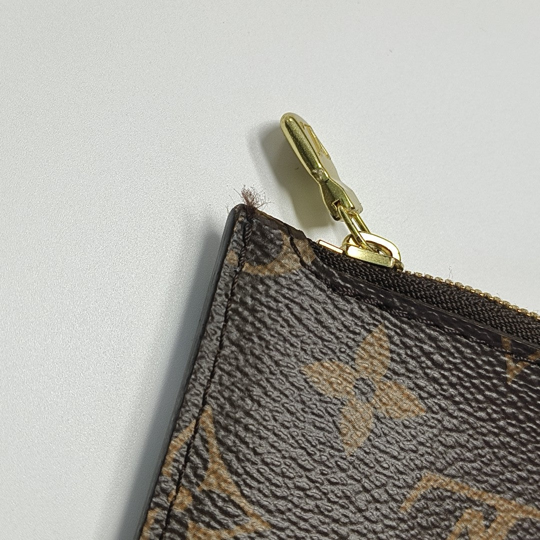 NEVERFULL MM Monogram Coated Canvas Brown